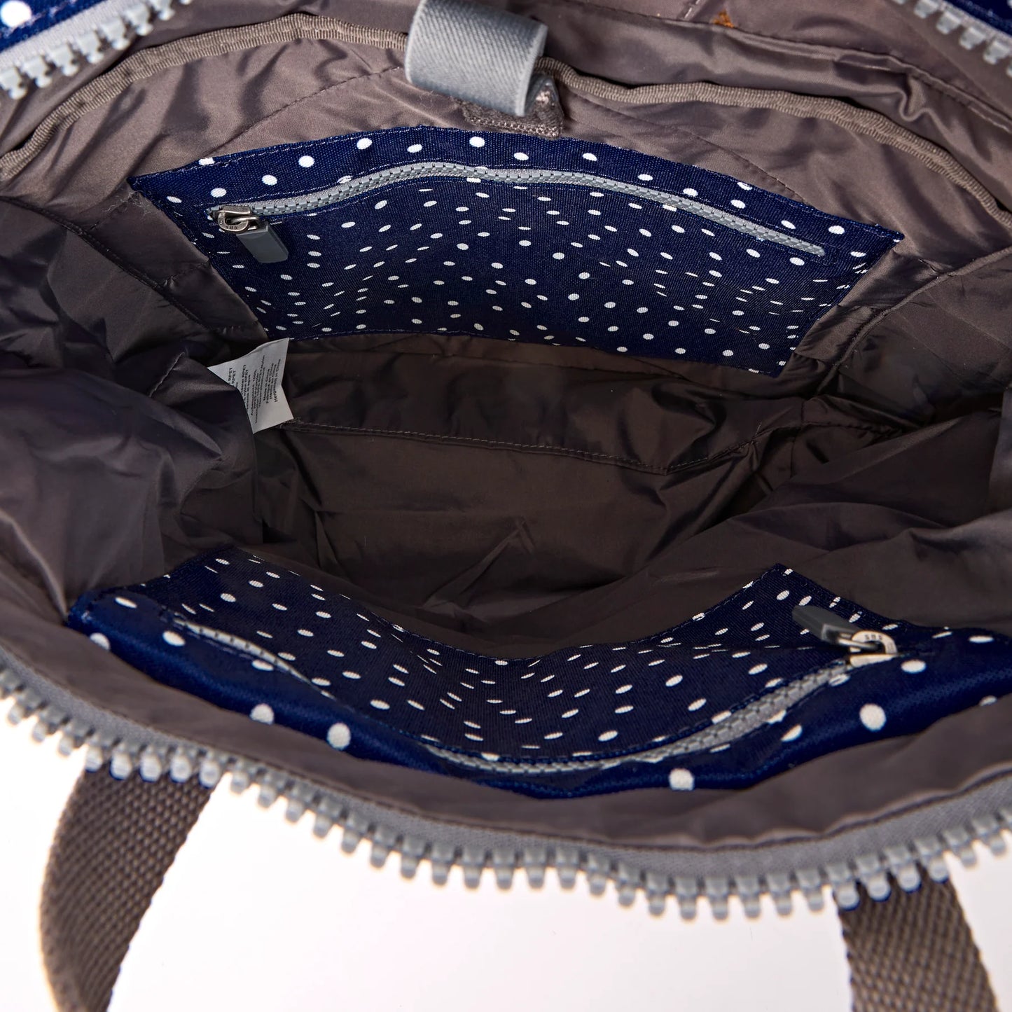 Roka - Canfield Backpack in Navy Polka Dot