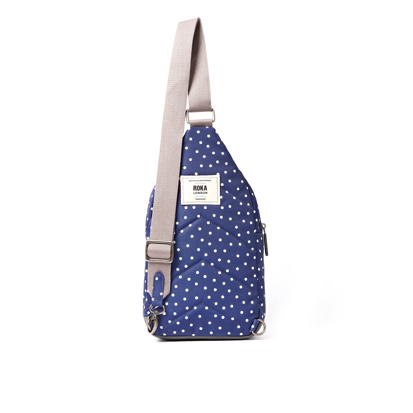 Roka - Willesden Sling Bag in Navy Polka Dot