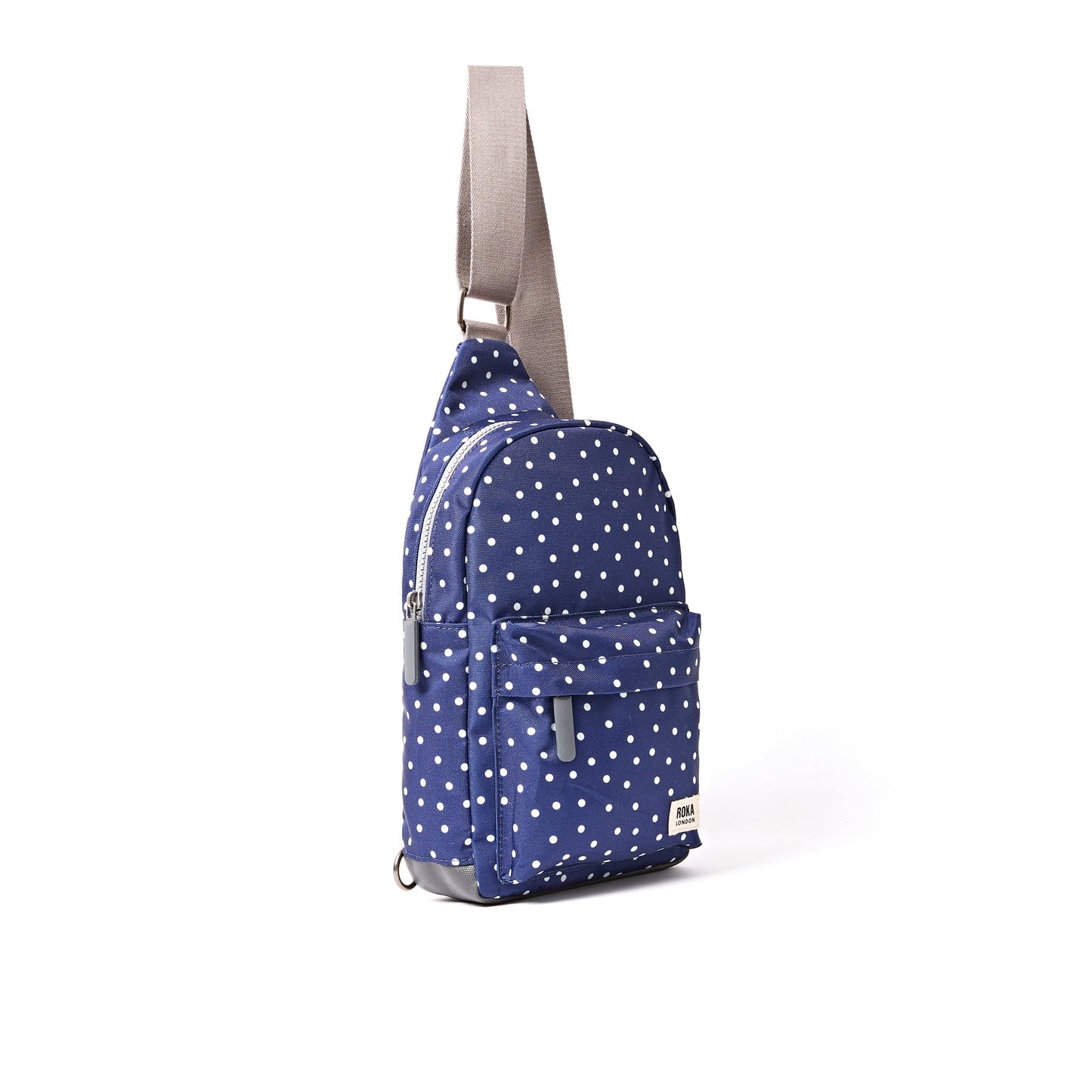 Roka - Willesden Sling Bag in Navy Polka Dot