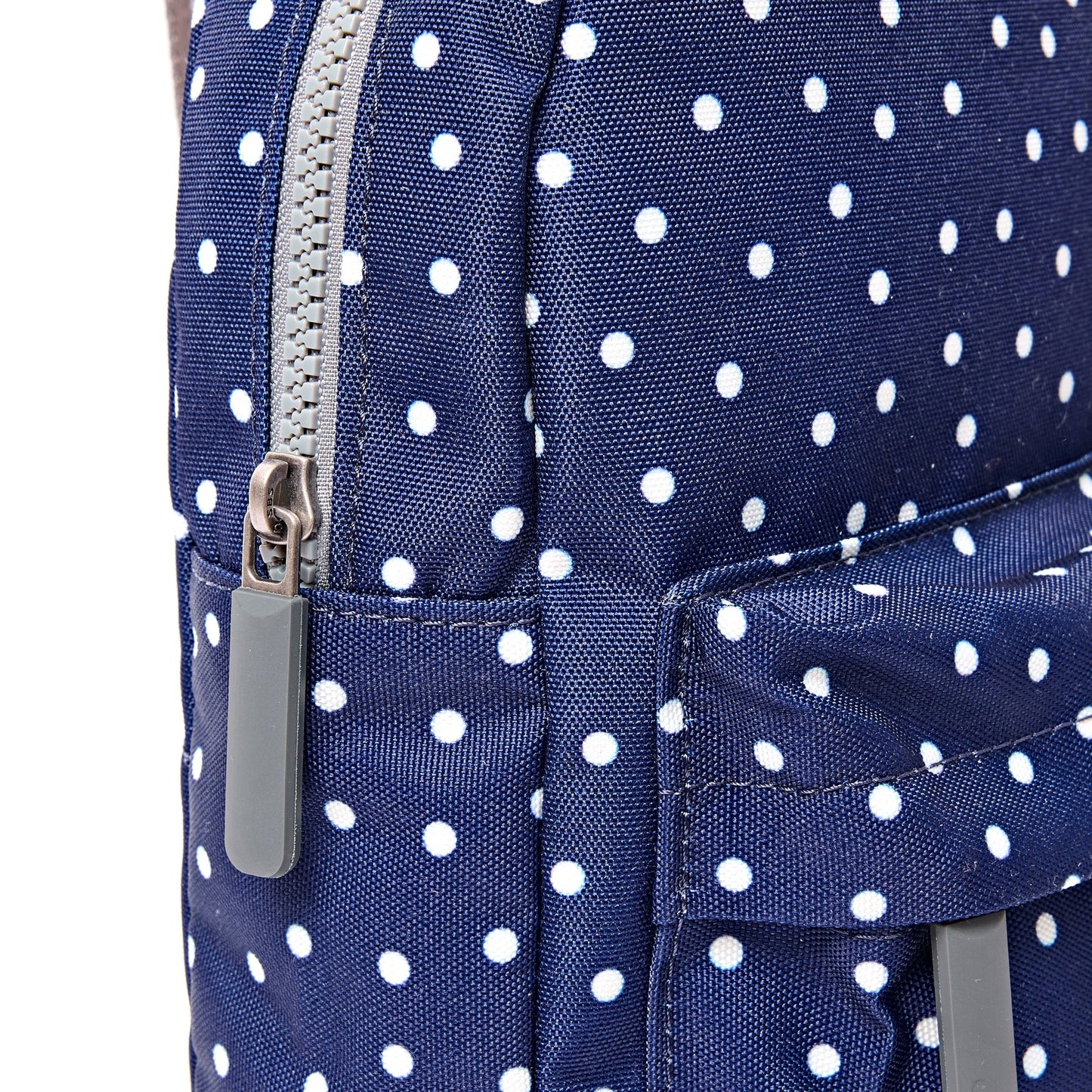 Roka - Willesden Sling Bag in Navy Polka Dot